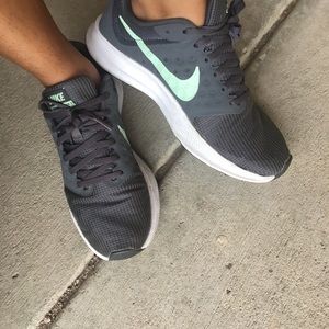 Well worn women’s Nike shoes